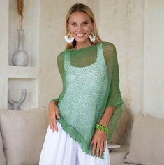 Comfortable and trendy. This poncho top is a practical essential for any wardrobe. Easy to pull on and easy to pair with so many different looks. The ruffled hem adds a feminine flair. Lightweight and very soft. Delicate material Lightweight and easy to travel with 100% soft rayon Use as a scarf Hand wash cold water, lay flat to dry One Size Casual Poncho For Spring, Oversized Summer Poncho For Layering, Oversized Poncho For Summer Layering, Casual One-size Poncho For Layering, Casual Batwing Sleeve Poncho For Spring, Oversized Knit Poncho For Summer, Trendy One-size Poncho For Spring, One-size Summer Poncho For Layering, One Size Summer Poncho For Layering