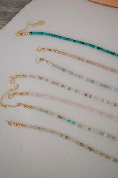 Our Leilani Beaded Necklace is your new must-have layering necklace! What do we love about it? With a range of gemstone options and the ability to choose between charm options including letters, a textured coin, or a pearl, this dainty necklace is perfect for layering while adding a personal touch. Crafted with high-quality gemstones and a secure clasp, this necklace is sure to be a staple in your wardrobe for years to come! Everyday 14k Gold-filled Necklaces With Tiny Beads, Everyday 14k Gold Filled Tiny Beads Necklace, Everyday 14k Gold-filled Necklace With Tiny Beads, Everyday 14k Gold Filled Necklace With Tiny Beads, Everyday Beaded 14k Gold-filled Necklaces, Everyday Beaded 14k Gold-filled Necklace, Everyday Beaded 14k Gold Filled Necklace, Everyday Delicate Necklaces With Natural Stones, Everyday 14k Gold Filled Beaded Necklace