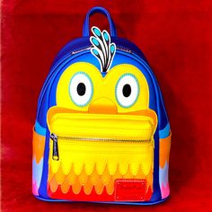 Nwt- Loungefly Disney Pixar Up Kevin Mini Backpack. Very Popular Bag That Is No Longer Available In Stores. Beautiful Bright Colors. Faux Leather Bag. Double Zipper Main Compartment. Front Pocket With Zipper Closure. Silver Tone Hardware. Adjustable Shoulder Straps. Top Carry Handle. Authentic Disney Parks Merchandise. Approx Measurements: 11.5” H X 8.5” W X 4.75” D Character Style Travel Backpack, Character Style Standard Backpack For Travel, Disney Leather Backpack For Disney Trips, Disney Leather School Bags, Disney Leather Backpack For School, Disney Leather School Backpack, Multicolor Character Backpack For Everyday Use, Disney Leather Backpack, Disney Leather Backpack For Everyday Use