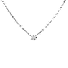 A timeless jewelry essential, this white diamond pendant will bring unparalleled sparkle to your neck. This elegant lab grown diamond glistens in 14k white gold metal. The oval shaped, brilliant lab-grown diamond radiates a beautiful white sparkle. It floats within the four-prong setting of this 14k white gold stud necklace. This lab-grown diamond is crafted to the highest standards and has a VS2-SI1 clarity grade. This dazzling oval shaped diamond has a total weight of 1/5 carat and comes with Classic Diamond Oval Pendant Necklace With Prong Setting, Classic Oval Pendant Diamond Necklace With Prong Setting, Classic Oval Pendant Necklace With Prong Setting, Classic Necklace With Oval Pendant And Prong Setting, Oval Diamond Solitaire Necklace With Prong Setting, Classic Solitaire Necklace With Brilliant Cut Oval Pendant, Fine Jewelry Solitaire Necklace With Brilliant Cut Oval Pendant, Timeless White Gold Oval Pendant Diamond Necklace, Classic Oval Pendant Necklace With Single Diamond