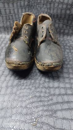 These rare vintage clogs are a Victorian era treasure. Crafted from high-quality brown leather and featuring a unique lace-up design (laces not available), they are a perfect addition to any antique collection.  The clogs are believed to date back to the 1850-1899 period, adding to their antique charm. These shoes are the perfect antique addition to any collection. These have not been polished as didn't want to ruin them.  These are in good condition considering the age of them. I have only give Victorian Shoes Women, Vintage Clogs, Womens Clogs And Mules, Leather Shoe Laces, Clogs And Mules, Brown Leather Shoes, Old Shoes, Shoes Vintage, Shoes Lace