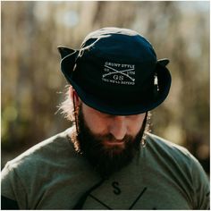 The Grunt Style Boonie Hat is the perfect accessory for any outdoor adventure in the summertime. Whether you're going on a hike, camping, or just spending a day outdoors, this Boonie Hat features a wide brim that will keep the sun off your face and neck to protect you from the elements. It is lightweight and comfortable with an adjustable chin strap to ensure a secure fit. One size fits most. Boonie hat with drawstring Polyester ripstop fabric Center front embroidery Metal eyelets Screen printed Hooey Hats, Boonie Hat, In The Summertime, Grunt Style, Patriotic Outfit, Ripstop Fabric, Denim Branding, Designer Jeans, Summer Sun