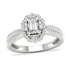 an engagement ring with a diamond center surrounded by diamonds