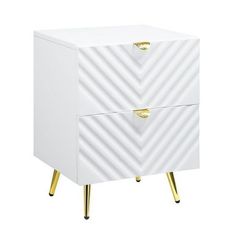 a white and gold nightstand with two drawers on one side, an open drawer in the other