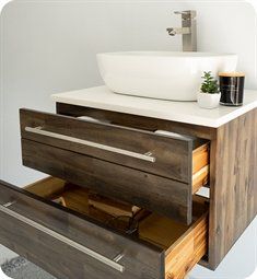 a bathroom with a sink and wooden drawers