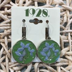 1928 Green Circle Flower Drop Earrings. The Earrings Are New In Package. Vintage Green Flower Earrings, Vintage Green Nickel-free Flower Earrings, Vintage Nickel-free Drop Flower Earrings, Vintage Nickel-free Jewelry For Spring, Vintage Spring Jewelry Nickel Free, Vintage Flower Earrings With Ear Wire, Vintage Flower Earrings For Spring, Vintage Nickel-free Flower Earrings, Vintage Flower-shaped Nickel-free Earrings