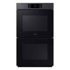 two black ovens side by side against a white background