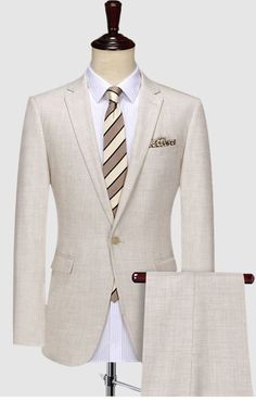 Men stone white suit with a single button front, side pockets with flaps, and single vent. Comes with a wider notch lapel offering a more classic and timeless look. The slim-fit pants complete the look. Ideal for any occasion. Office Sets With Slim Fit And Notch Lapel, Elegant Fitted Suits With Pressed Crease, Elegant Fitted Suit With Pressed Crease, Single Breasted Slim Fit Office Sets, Elegant Fitted Single-breasted Tuxedo, Luxury Fitted Sets For Workwear, Elegant Slim Fit Blazer, Beige Tuxedo Set For Business, Slim Fit Single Button Suiting Sets