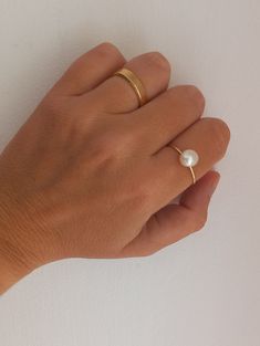 Hypoallergenic, extremely long-lasting 24k gold-plated adjustable ring. Decorated with river pearl! Elegant, chic, refined. It can also be worn together with other rings. Comfortable and light. Everyday Gold Ring With Pearl Charm, Gold Everyday Pearl Ring With Pearl Drop, Everyday Gold Pearl Drop Ring, Everyday Gold Pearl Ring With Pearl Drop, Minimalist Adjustable Pearl Ring For Formal Occasions, Everyday Gold Pearl Ring, Minimalist Gold Pearl Ring For Wedding, Everyday Gold Pearl Open Ring, Gold Pearl Charm Open Ring