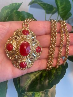 This listing is for a beautiful necklace.  Please review pics carefully before purchasing Red Metal Necklace With Large Pendant, Ornate Red Cabochon Jewelry, Vintage Red Round Pendant Jewelry, Formal Red Medallion-shaped Jewelry, Red Long Necklace Jewelry For Gifts, Red Pendant Necklace With Chain, Costume Jewelry Necklace With Large Medallion Pendant, Retro Red Necklace For Party, Retro Long Necklace As A Gift