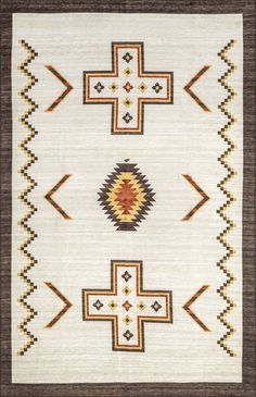 an old navajo rug is shown with different colors and designs on the carpet, including arrows