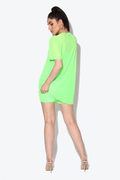 Catch eyes and turn heads this festival season in our Miami Neon Green Oversized Mesh T-shirt. Get summer ready with our oversized tee it’s the perfect poolside cover up during the day or add biker shorts and heels for a neon evening look. Designed in London for KARIZMAFabric: MeshLength: 77cm Gentle dry clean or gentle hand wash cold water and hang to dry. Model is 5 ft 7 and wears a size small.Please use our size guide for body measurements when purchasing, our garments run true to size. Oversized Athleisure T-shirt For Summer, Oversized Summer T-shirt, Green Summer Streetwear Tops, Sporty Green Beach Tops, Green Sporty Top For Beach Season, Sporty Green Tops For Beach Season, Short Beachwear Tops For Summer, Summer Crew Neck Top For Loungewear, Summer Loungewear Top With Crew Neck