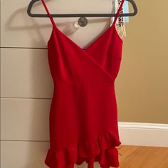 Lulus Red Dress In Size Xs. Worn Once To A Dance But Is In Brand New Condition. Fitted Red Mini Dress With Ruffle Hem, Red Mini Dress With Ruffle Hem, Red Mini Dress With Ruffle Hem For Night Out, Red Mini Dress With Ruffle Hem For Party, Red V-neck Mini Dress With Ruffles, Flirty Red Mini Dress With Ruffles, Red V-neck Mini Dress With Ruffle Hem, Red Cocktail Dress With Ruffle Hem, Red Ruffle Mini Dress For Cocktail