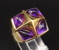 14K GOLD - Vintage Polished Four Purple Stone Square Dome Ring Sz 8 - GR571  Jewelry Type:          Ring  Metal Type:             14k Gold   Metal Size:              8 Finger  Stone Type:             Purple Stone    Condition:               N/A  Jewelry Weight:      7.1 Grams  PLEASE NOTE: THIS ITEM IS PRE-OWNED. ALTHOUGH MOST ITEMS ARE IN VERY GOOD CONDITION, SOME MAY NEED CLEANING AND/OR MINOR REPAIRS. WE MAKE A VERY STRONG EFFORT TO UPLOAD CLEAR PICTURES. PLEASE INSPECT ALL PICTURES AND ASK ALL QUESTIONS YOU MAY HAVE PRIOR TO MAKING A PURCHASE. NOT ALL STONES ARE GENUINE, SOME ARE ENHANCED OR CREATED. Antique Jewelry Rings, Clear Pictures, Dome Ring, Purple Stones, Domed Ring, Ring Metal, Vintage Watches, Antique Jewelry, Vintage Antiques