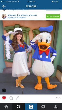 two people dressed as donald and daisy duck