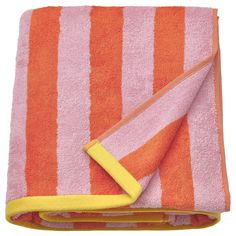 an orange and pink striped towel folded on top of each other with a yellow strip