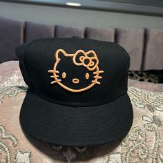 Hello Kitty Trucker Hat New Cute Black Baseball Cap With Curved Brim, Trendy Black Flat Brim Baseball Cap, Cute Black Snapback Baseball Cap, Cute Adjustable Black Baseball Cap, Black Brimmed Fitted Hat, Black Casual Brimmed Fitted Hat, Casual Black Brimmed Fitted Hat, Trendy Cat Design Hats With One Size Fits Most, Cute Black Baseball Cap