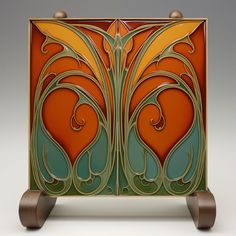 an artisticly designed cabinet on wheels with wood handles and knobs, painted in vibrant colors