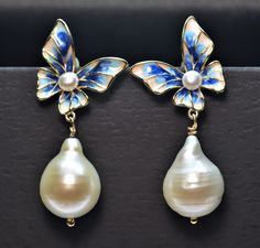 "🌹Welcome to JeansJewelryStudio!🌹 DESCRIPTION Beautiful enameled butterfly earrings! The design uses enameled gold vermeil decorated with tiny white freshwater pearls, and baroque freshwater cultured pearls! Full of shine, these pearls are utterly breathtaking. The color is the ideal, most highly coveted truly luminous Ivory. These freshwater pearls are not given any treatments after harvesting. They are truly artisan jewelry with the unique and stylish design. Pearl earrings are a classic add Elegant Hypoallergenic Butterfly Jewelry, Elegant Butterfly Earrings For Formal Occasions, Elegant Handmade Butterfly Jewelry, Elegant Pierced Butterfly Jewelry, White Pierced Butterfly Earrings, Luxury Baroque Earrings For Women, White Butterfly Shaped Pierced Earrings, Butterfly-shaped Wedding Jewelry With Matching Earrings, Pearl Butterfly Earrings