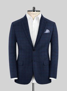 Elevate your formal style and feel comfortable in the Italian Ermene Blue Wool Jacket, which exudes class and fashion. Crafted from pure merino wool, it maintains a sharp sense of style while adding a touch of traditional elegance. Additionally, the modern blend of blue plaids makes it a versatile choice for any occasion. Enhance your wardrobe with this chic outfit that is sure to leave a lasting impression. 
 
 Look features a 2 button jacket with notch lapels, horn royal black buttons, single Tailored Long Sleeve Sport Coat For Semi-formal Occasions, Blue Tweed Jacket With Suit Collar For Business Casual, Elegant Wool Blazer With Custom Fit, Dapper Winter Wool Suit, Elegant Wool Blazer Custom Fit, Blue Tweed Jacket With Lapel Collar For Business Casual, Classic Long Sleeve Suit For Office Wear, Elegant Wool Outerwear Custom Fit, Luxury Custom Fit Wool Blazer