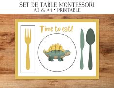 a place setting with an image of a dinosaur on it and the words time to eat