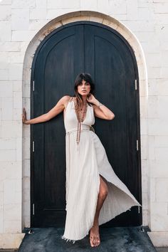 Bohemian V-neck Maxi Dress For Beach Wedding, Bohemian Sleeveless Maxi Dress For Wedding, Bohemian Sleeveless Wedding Maxi Dress, Bohemian V-neck Cream Maxi Dress, Cream Bohemian V-neck Maxi Dress, Cream V-neck Bohemian Maxi Dress, White Maxi Dress For Destination Wedding In Summer, Flowy Off White Maxi Sundress, Cream Boho Maxi Dress For Beach