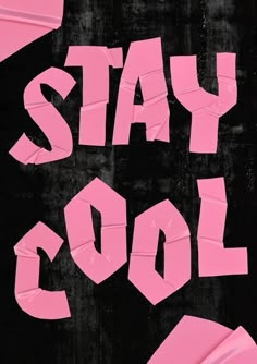 the words stay cool are cut out of pink and black paper with torn up letters