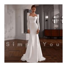 a woman in a white wedding dress standing on a wooden floor with the words simply you