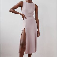 Stunning And Classy Dress! Perfect For Grabbing Cocktails Or Standing Out At A Wedding! Modest Yet Sexy With Exposed Back And Thigh Split! Loved It But It’s A Tad Small On Me. 90s Vibe All The Way. Cocktail Midi Dress With Side Slits And Backless Design, Backless Midi Dress With Side Slits For Cocktail, Knee-length Dresses With Side Slits For Date Night, Summer Backless Midi Dress With Side Slits, Backless Summer Midi Dress With Side Slits, Chic Sleeveless Backless Dress For Spring, Summer Formal Sleeveless Backless Dress, Backless Sleeveless Summer Dress For Formal Occasions, Chic Backless Dress With Split Design