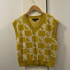 Yellow Knit Vest With Yin Yang Pattern. Never Worn, Brand New Condition. Casual Yellow Winter Tops, Casual Yellow Spring Sweater, Yellow Knitted Crew Neck Top, Yellow Cotton Knitted Sweater, Yellow Cotton Summer Sweater, Casual Yellow Knit Sweater Vest, Casual Yellow Cotton Sweater Vest, Casual Yellow Sweater Vest For Winter, Casual Yellow Sweater Vest For Fall