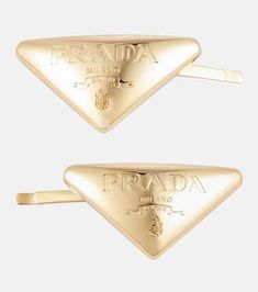 Showcase your devotion to Prada with any look, courtesy of this hair clip. It's made from metal and adorned with the house's iconic triangle logo plaques..Material: brass.Made in Italy.Length 7cm-3'.Width 3cm-1' Logo Hair, Prada Jewelry, Prada Logo, Triangle Logo, Shop Logo, Clip Ins, Free Jewelry, Hair Clip, Hair Clips