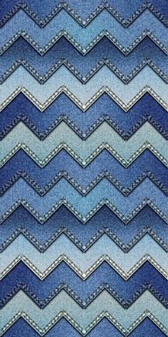 a blue and white chevroned pattern with some small waves on it's side