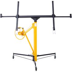 a yellow television antenna on top of a metal stand with one arm extended and the other arm down