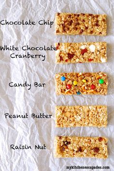 three granola bars are lined up on top of each other with different toppings