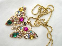 My goal is for you to be pleased with your purchase, and to earn your 5-star feedback Should you have any concerns about your item, please email and I will correct the situation. Betsey Johnson multicolor crystal butterfly necklace. This large BUTTERFLY is 2.25" across and 2.5" long. The chain is about 26" long. I have other colors listed. Butterfly lovers will enjoy! New with tags COMBINED SHIPPING: If you would like to buy any additional jewelry items, with free shipping, please add all the it Multicolor Jeweled Rhinestone Necklace Gift, Multicolor Jeweled Rhinestone Necklace For Gift, Crystal Butterfly Necklace, Largest Butterfly, Crystal Butterfly, Necklace Green, Green Necklace, Butterfly Necklace, Fashion Jewelry Necklaces