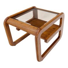 a wooden and glass side table on white background