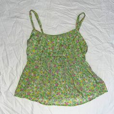 Green Flowerful Tank Top. With Adjustable Straps And Cinching On The Back. Sweat Proof And Soft Material! Summer Green Printed Top, Green Floral Print Tank Top For Spring, Green Cami Top For Spring, Floral Print Cami Top For Vacation, Cute Floral Print Cami Top, Green Floral Print Summer Top, Summer Beach Top With Ditsy Floral Print, Summer Floral Print Cami Top, Cute Floral Print Tank Top For Spring