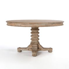 an old wooden table with four legs and a round top, on a white background