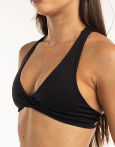 The Freedom Sportsbra combines everything you need in the support of a sports bra into a crop top design. The Freedom Sportsbra is incredibly soft, breathable and perfected in both fit and design - Double lined with no padding - Support is light to moderate - Supportive straps with a crossback design - Fabric is incredibly soft and breathable 80% Polyester, 20% Spandex Bella is wearing a Small, is 5'4" Supportive Activewear With Built-in Bra For Light Sports, Versatile Racerback Sports Bra With Light Support, Racerback Crop Top With Built-in Padding For Yoga, Versatile Gym Sports Bra With Go-dry Technology, Versatile Go-dry Sports Bra For Gym, Sporty Racerback Crop Top With Built-in Bra, Versatile Racerback Sports Bra For Light Exercise, Workout Halter Crop Top With Built-in Bra, Racerback Crop Top With Light Support For Sports