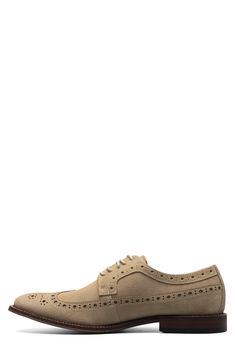 Anatomical arch support ensures lasting comfort in a refined derby with wingtip accents for a defined look. Removable, cushioned insole with arch support Leather upper/synthetic and textile lining/rubber sole Imported Casual Wingtip Lace-up Shoes With Removable Insole, Fitted Wingtip Dress Shoes With Removable Insole, Classic Beige Oxfords With Rubber Sole, Classic Beige Lace-up Oxfords, Classic Beige Wingtip Oxfords, Derby Wingtip Oxfords With Removable Insole, Wingtip Oxfords With Removable Insole For Derby, Classic Beige Oxfords For Business, Classic Beige Oxfords With Textured Sole