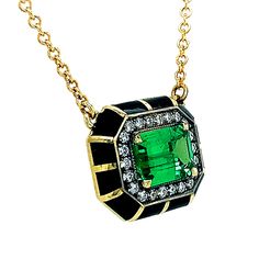 Tsavorite, a type of garnet, is prized for its pure green hue and is stunning when paired with diamonds. This eye-catching emerald-cut gemstone stands out against the midnight black enamel. A scintillating halo of accent diamonds complements the beauty of this rare gemstone, adding one more dimension of romance to this incredible one-of-a-kind piece. All of this is complemented by 18-karat yellow gold detail including the chain and accents on the pendant. This wearable piece of art will be appre Luxury Green Emerald Cut Necklace, Green Emerald Necklace With Single Cut Diamonds, Luxury Emerald Cut Gemstone Necklace, Luxury Emerald Necklace With Jewels, Luxury Emerald Cut Emerald Necklace With Diamond Accents, Luxury Oval Tsavorite Jewelry, Luxury Tsavorite Jewelry With Gemstone Accents, Luxury Tsavorite Gemstone Necklace, Luxury Green Emerald Necklace With Diamond Accents