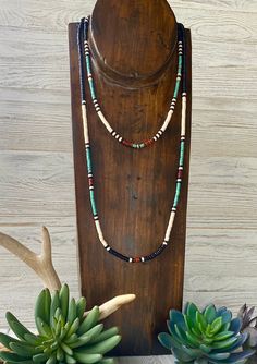 Part of our Native American Jewelry collection with black turquoise & rustic brown Heishi beads. These necklaces are beautiful together but bold enough as a single piece. Each necklace has an extender for the perfect length. Beads 5&6mm. Short necklace 22” -25” Long necklace 34”-37” Cheap Southwestern Style Necklaces With Tiny Beads, Cheap Southwestern Style Necklaces For The Beach, Southwestern Jewelry Bedroom, Western Jewelry Necklace Bohemian, Western Jewelry Necklace Casual, Cheap Handmade Western Style Necklaces, Native American Woman Jewelry, Affordable Southwestern Necklace With Tiny Beads, Cheap Southwestern Style Beaded Necklaces