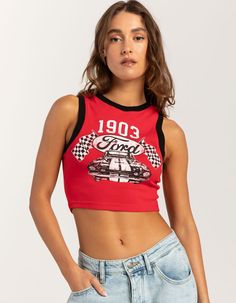 Ford 1903 Tank Top. Graphic Screened On Front. Crewneck. Sleeveless. Contrast Trim. Fitted And Cropped Silhouette. 58% Cotton, 37% Polyester, 5% Spandex. Machine Wash. Imported. Model Is Wearing A Size Small. Model Measurements:height: 5'8" Bust: 34"waist: 25"hips: 37.5" Sleeveless Sports Top For Summer, Fitted Graphic Print Crop Top With Racerback, Fitted Racerback Crop Top With Graphic Print, Sporty Sleeveless Muscle Tee For Spring, Graphic Print Stretch Tank Top, Spring Sporty Sleeveless Muscle Tee, Trendy Sleeveless Elastane Crop Top, Spring Sports Muscle Tee Sleeveless, Trendy Fitted Muscle Tank Tee