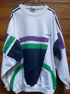 Retro Adidas sweatshirt from the 90s, very good condition, unique model, L pattern. 90s Style Long Sleeve Streetwear Sweatshirt, 90s Long Sleeve Streetwear Sweatshirt, 90s Long Sleeve Streetwear Sweater, Sporty Multicolor Crew Neck Sweatshirt, 90s Style White Crew Neck Sweater, Vintage White Crew Sweatshirt, White Crew Neck Sweater In 90s Style, White Throwback Sweatshirt With Graphic Print, White Long Sleeve Throwback Sweatshirt