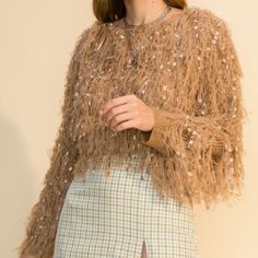 Cute Fuzzy Sweater. Great Quality. Material Feels Good On Skin. Trendy Fall Party Sweater, Brown Winter Party Tops, Winter Party Brown Tops, Chic Fringe Tops For Fall, Trendy Fringe Tops For Winter, Fringe Tops For Fall Party, Fall Party Tops With Fringe Details, Fall Party Tops With Fringe, Brown Fringe Top For Fall