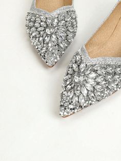 Elevate your style with Sparkling Elegance - low-heeled women's shoes adorned with shiny rhinestones. Perfect for parties and banquets, they add a touch of glamour and sophistication to any outfit. With a comfortable heel, you can dance the night away in style. Expertly crafted for any fashion-forward woman. Color : Silver Upper Material : Glitter Lining Material : PU Leather Insole Material : PU Leather Outsole Material : PU Leather Size US Ball Girth Foot Length Heel Height EUR35 US5 21 22.3 0.6 EUR36 US6 21.4 22.9 0.6 EUR37 US6.5 21.8 23.5 0.6 EUR38 US7 22.2 24.1 0.6 EUR39 US8 22.6 24.7 0.6 EUR40 US9 23 25.3 0.6 EUR41 US9.5 23.4 25.9 0.6 EUR42 US10.5 23.8 26.5 0.6 EUR43 US11 24.2 27.1 0.6 Elegant Low Heel Flats With Rhinestones, Elegant Closed Toe Flats With Rhinestones, Elegant Low-heel Flats With Rhinestones, Flat Wedding Shoes With Rhinestones, Evening Flats With Rhinestones And Pointed Toe, Elegant Flat Wedding Shoes With Rhinestones, Formal Pointed Toe Flats With Rhinestones, Formal Closed Toe Flats With Rhinestones, Evening Flats With Rhinestones And Round Toe