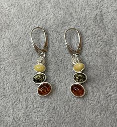 Genuine AMBER DANGLE Earrings with Sterling Silver.MULTI Color Amber Earrings. Amber Dangle Earrings With Lever Back, Amber Dangle Earrings With Lever Back Ear Wires, Amber Drop Earrings With Ear Wire, Hypoallergenic Amber Dangle Earrings, Amber Dangle Earrings, Pierced, Yellow Metal Dangle Earrings, Amber Dangle Pierced Earrings, Yellow Dangle Earrings With Lever Back, Pierced Amber Earrings