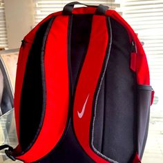 Nike Red Carry Backpack Brand New Nike Red Travel Bag, Red Nike Travel Bag, Red Backpack For Students, Red Backpack With Zipper Closure For Students, Red School Backpack With Zipper Closure, Red Rectangular Student Backpack, Red Backpack For Students, Back To School, Red Backpack For Travel And Back To School, Red Standard Backpack With Zipper Closure