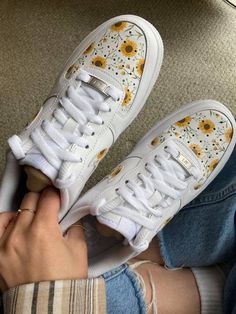 Customized AF1's with hand-painted sunflower design! This design is painted on brand new white women's Nike Air Force 1 '07's (come with box). Unlike my other listing, this design is also painted on the toe boxes of the shoe. These shoes are made to order, so I do not accept returns/refunds. Shoes are painted with Angelus leather paint and then sealed with a waterproof matte acrylic finisher (also Angelus brand). Feel free to message me with any questions you might have about this product :) Painted Air Force 1 Ideas, Custom White Sneakers For Spring, Casual White Custom Sneakers With Artwork, Casual Hand Painted White Custom Sneakers, Casual Hand Painted White Sneakers, Trendy White Custom Sneakers For Spring, Sporty White Sneakers With Floral Print, White Custom Sneakers For Summer Streetwear, Trendy White Sneakers With Floral Print