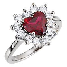 a red heart shaped ring with white diamonds on it's sides and the center surrounded by smaller round stones